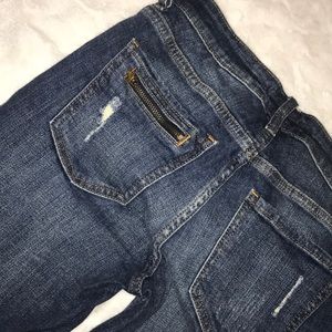 Low rise zipper skinny jeans slightly distressed